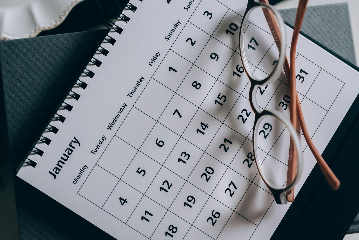 A calendar with glasses